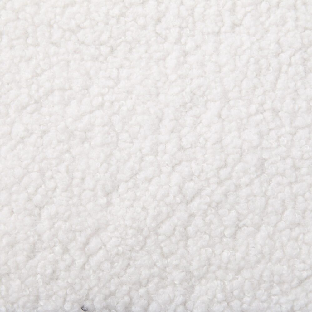 Close-up of a textured white dining chair surface