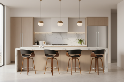A modern kitchen island setup with a white marble countertop and backsplash, light wood cabinetry, three pendant lights, a stainless steel refrigerator, and four bar stools with black seats and brown wooden legs.