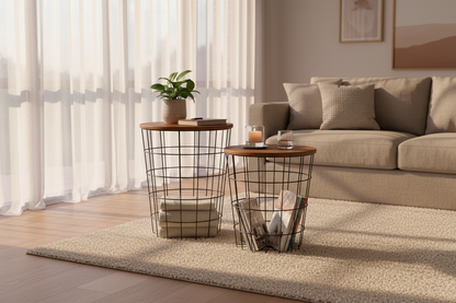 Two round wire baskets with wood-look tops are styled in a soft evening light living room with beige couch, matching rug, cushions and wall arts