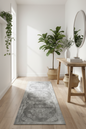 Gray patterned rug with intricate designs