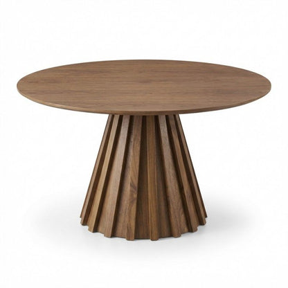 Wooden round table with a unique base design on a white background