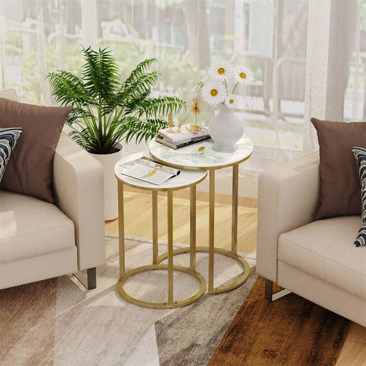 Modern living room with beige sofa, glass tables, and decorative items.
