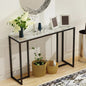 Console table with decorative items in a room setting
