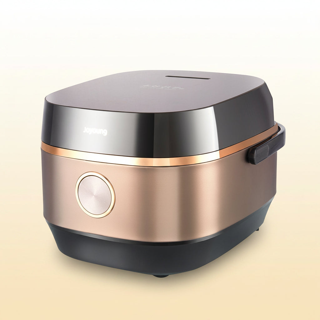 Stainless steel and rose gold electric pressure cooker on a white background