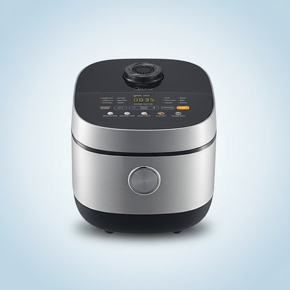 Silver and black rice cooker on a white background