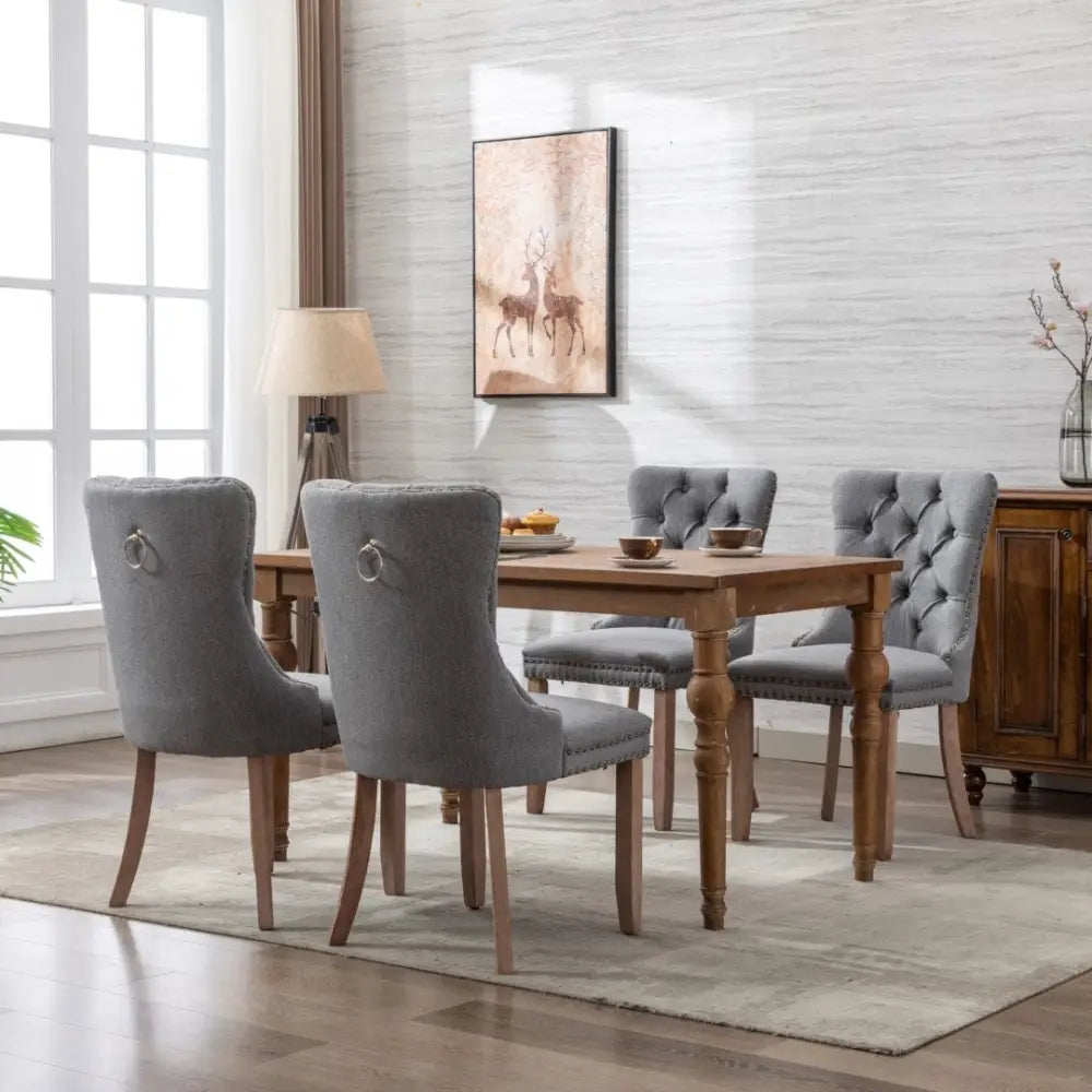 Aaden Modern Elegant Button-tufted Upholstered Fabric with Studs Trim and Wooden Legs Dining Side Chair-gray