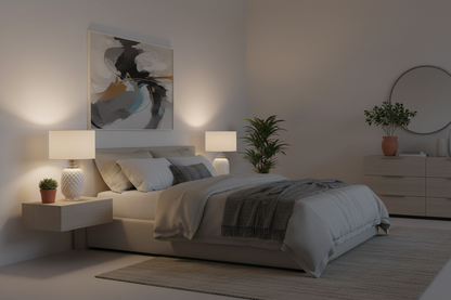 Modern bedroom with a bed, nightstands, and wall art.