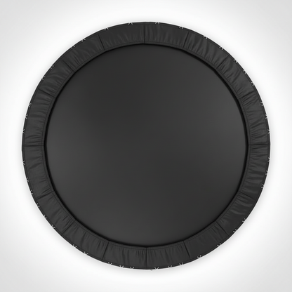 A top-down view of a black round trampoline with a 12ft black jumping mat and a black elastic safety surround on a white background.