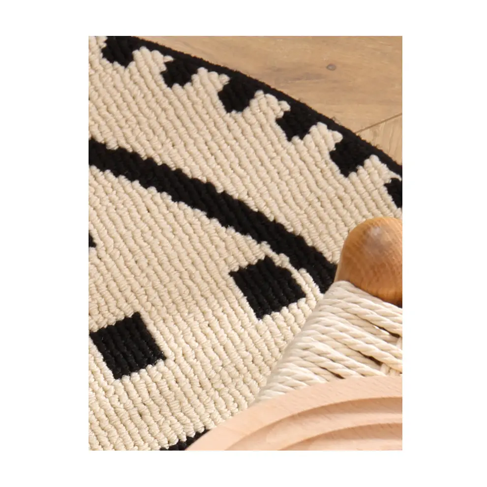 Meragh White Modern Round Area Rug with Geometric Black and Pattern